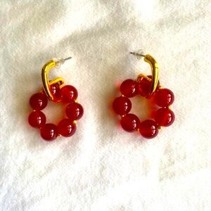 New red dominent two tone earrings .